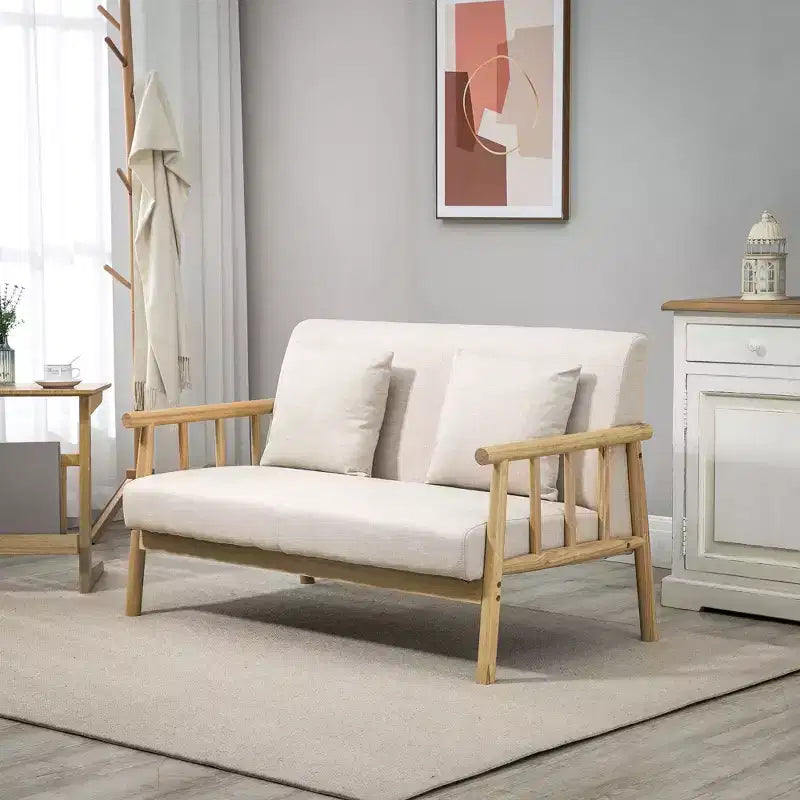 Canapé 2 places beige rembourré avec coussins décoratifs