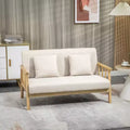 Canapé 2 places beige rembourré avec coussins décoratifs