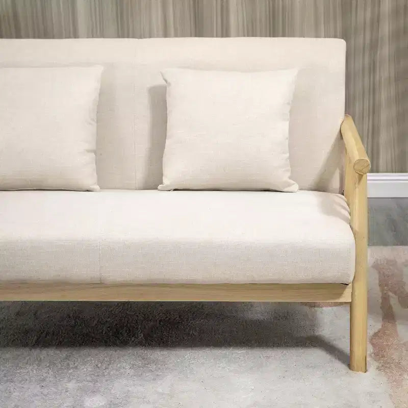 Canapé 2 places beige rembourré avec coussins décoratifs